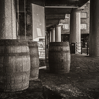 Buy canvas prints of Barrels at the dock  by Paul Madden