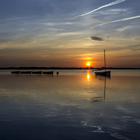 Buy canvas prints of Boats on the lake at sunset by Paul Madden