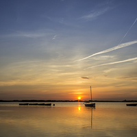 Buy canvas prints of Sunset on the lake by Paul Madden