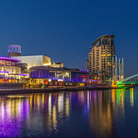 Buy canvas prints of Salford Quays panorama at night by Paul Madden