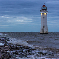 Buy canvas prints of Lighthouse on the rocks by Paul Madden