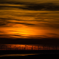 Buy canvas prints of Sunset over the wind farm by Paul Madden
