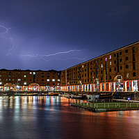 Buy canvas prints of Lightning over the Albert Dock by Paul Madden