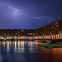 Buy canvas prints of Lightning over the Royal Albert Dock by Paul Madden