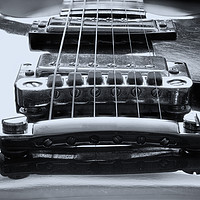 Buy canvas prints of Tune-O-Matic bridge and Humbuckers in monochrome. by RSRD Images 