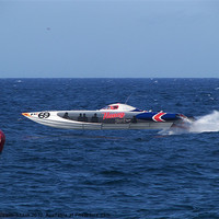 Buy canvas prints of Offshore powerboat at speed by Malcolm Snook