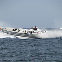 Buy canvas prints of Offshore Powerboat Racer by Malcolm Snook