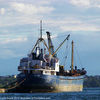 Buy canvas prints of Cargo ship in the islands by Malcolm Snook