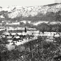 Buy canvas prints of Llanbradach Village in the Snow. Wales. by David Metters