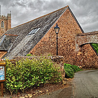 Buy canvas prints of Church of St George & Tithe Barn, Dunster by Darren Galpin