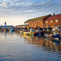 Buy canvas prints of Scarborough Harbour and Lighthouse,North Yorkshire by Darren Galpin