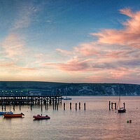 Buy canvas prints of Swanage Pier and Ballard Down at Sunset by Darren Galpin