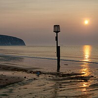 Buy canvas prints of Sunrise over Swanage Bay, Dorset by Darren Galpin