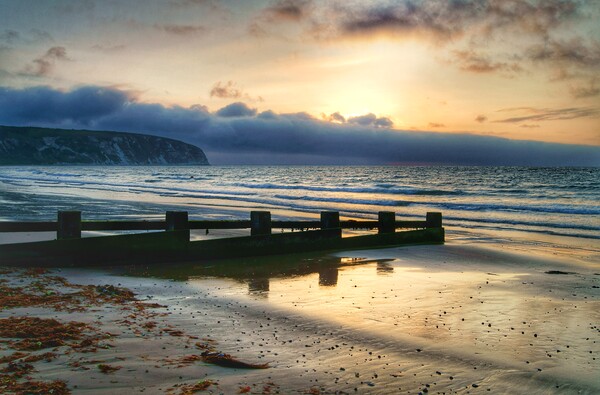 Sunrise over Swanage Bay, Dorset  Picture Board by Darren Galpin