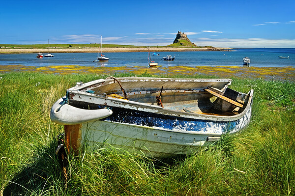 Lindisfarne Castle and Boat Picture Board by Darren Galpin