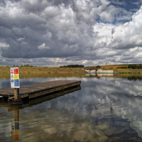 Buy canvas prints of Ulley Jetty and Storm Clouds  by Darren Galpin