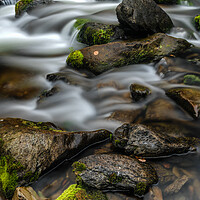 Buy canvas prints of A large waterfall over some water by Darren Ball
