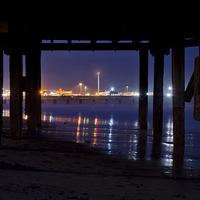Buy canvas prints of  Through the pier by Paul Nichols