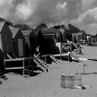 Buy canvas prints of abersoch beach huts by Shaun Cope