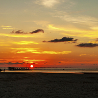 Buy canvas prints of Setting Sun Fort Myers Florida by Pete Lawless