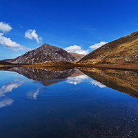 Buy canvas prints of  Llyn Idwal Reflecting Pen Yr Old Wen by Pete Lawless