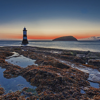 Buy canvas prints of  Sunrise Penmon Point by Pete Lawless