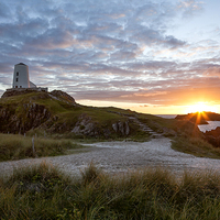 Buy canvas prints of  Tyr Mawr Lighthouse at Sunset by Pete Lawless