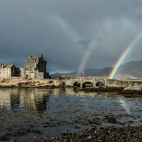 Buy canvas prints of Rainbows Eilean Donan Castle by Pete Lawless