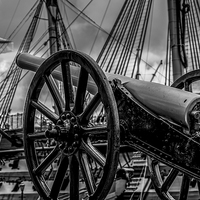 Buy canvas prints of  Late 1800s Breech Cannon & HMS Victory. by Jon Mills