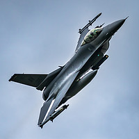 Buy canvas prints of F16 Flying through the Mack Loop by Colin Keown