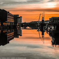 Buy canvas prints of The Sun Setting over the Docks  by Jane Metters