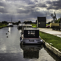 Buy canvas prints of Boats Resting at Thurne's Waters by Avril Harris