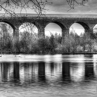 Buy canvas prints of Viaduct at Reddish Vale Country Park by Avril Harris