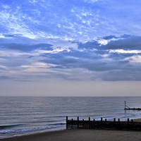Buy canvas prints of  Walcott seafront Norfolk by Avril Harris