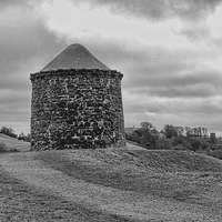 Buy canvas prints of Beacon Tower at Burton Dassett Black and White  by Avril Harris