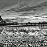 Buy canvas prints of Cromer Pier in the Evening by Avril Harris