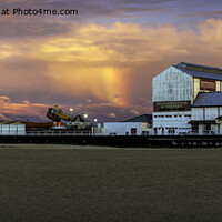 Buy canvas prints of Rainbow over the Brittania pier Great Yarmouth by Avril Harris