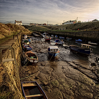 Buy canvas prints of A Surreal Scene of Abandoned Boats by George Davidson