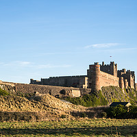Buy canvas prints of Bamburgh Castle 01 by George Davidson